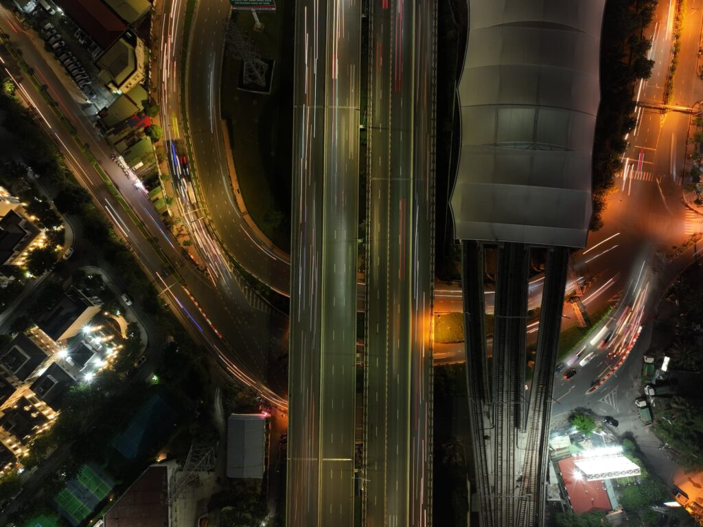 Aerial night highway overpass