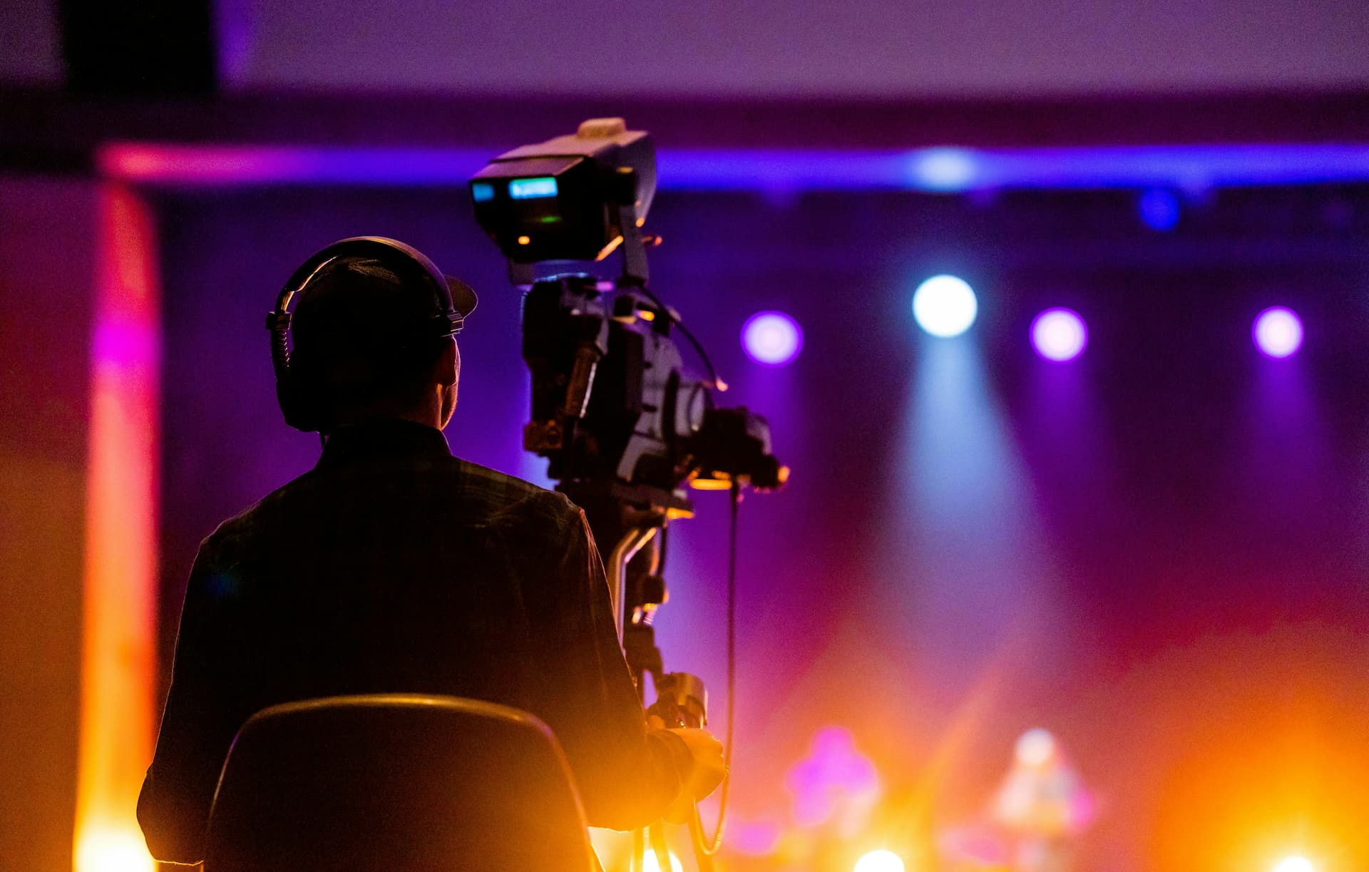 Event cameraman stage lighting silhouette