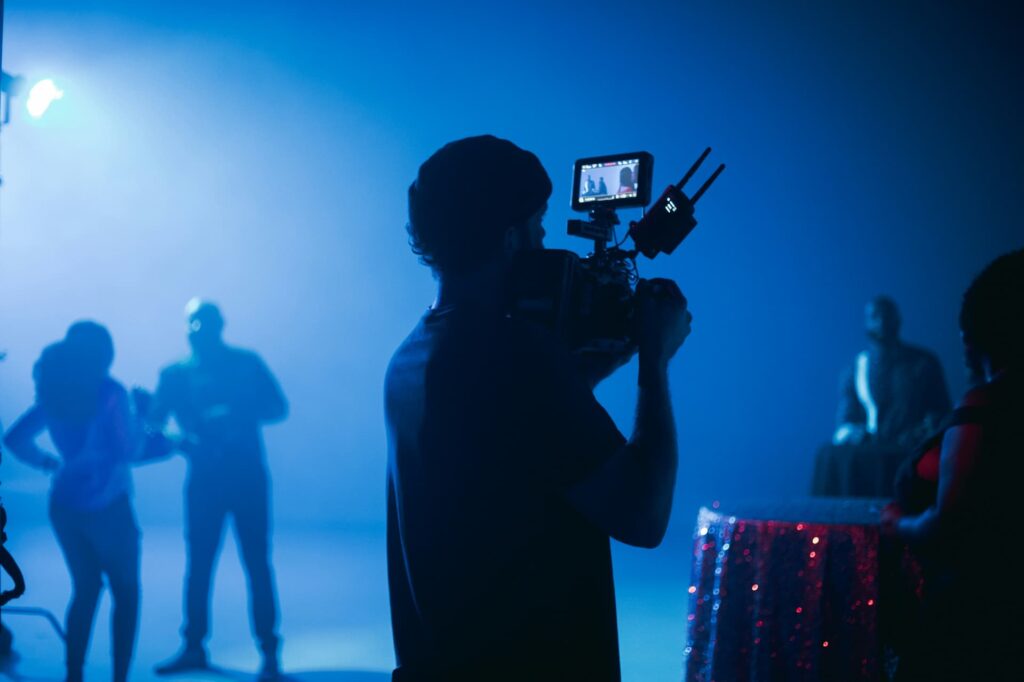 Event videographer blue lighting silhouette