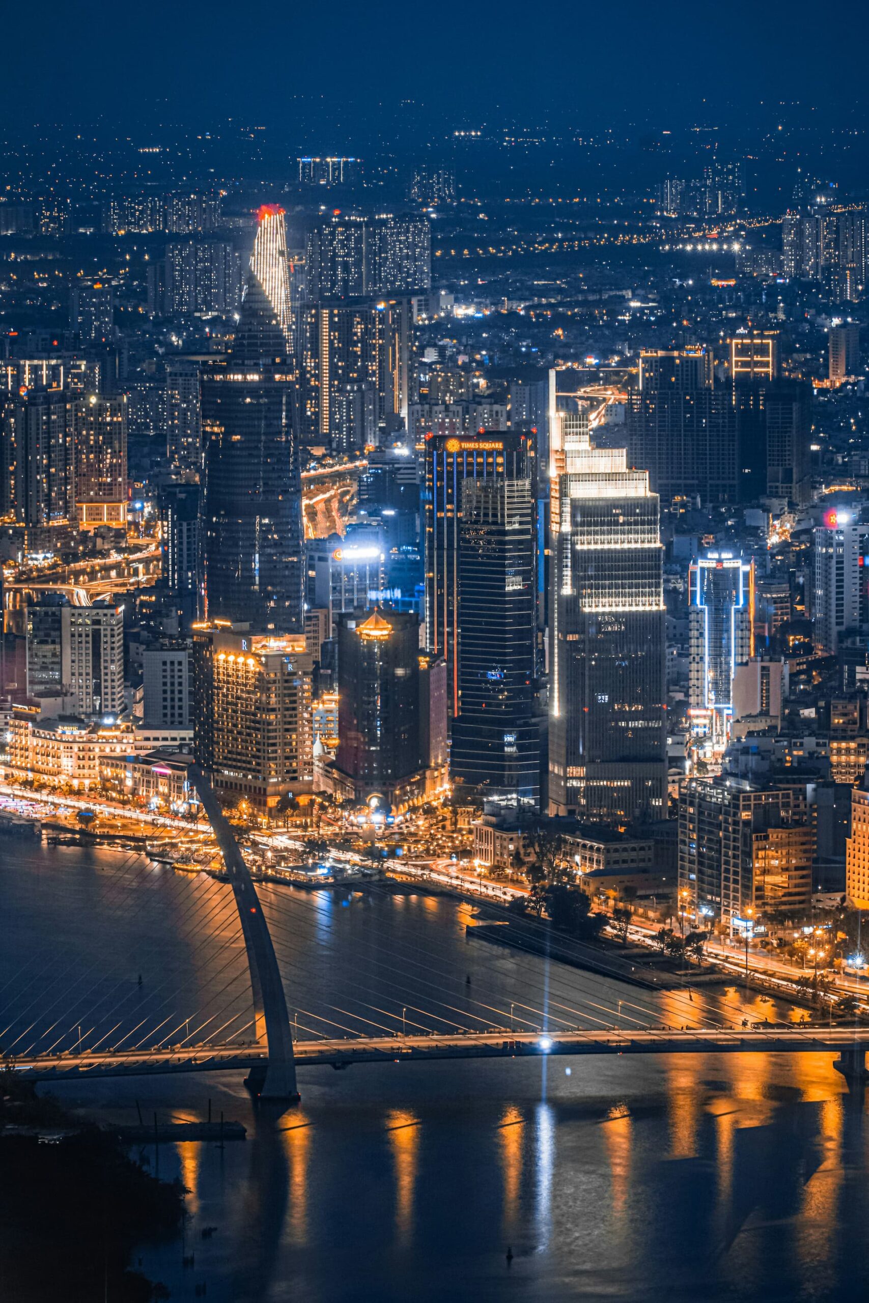 Ho Chi Minh City skyline at night above the Saigon River